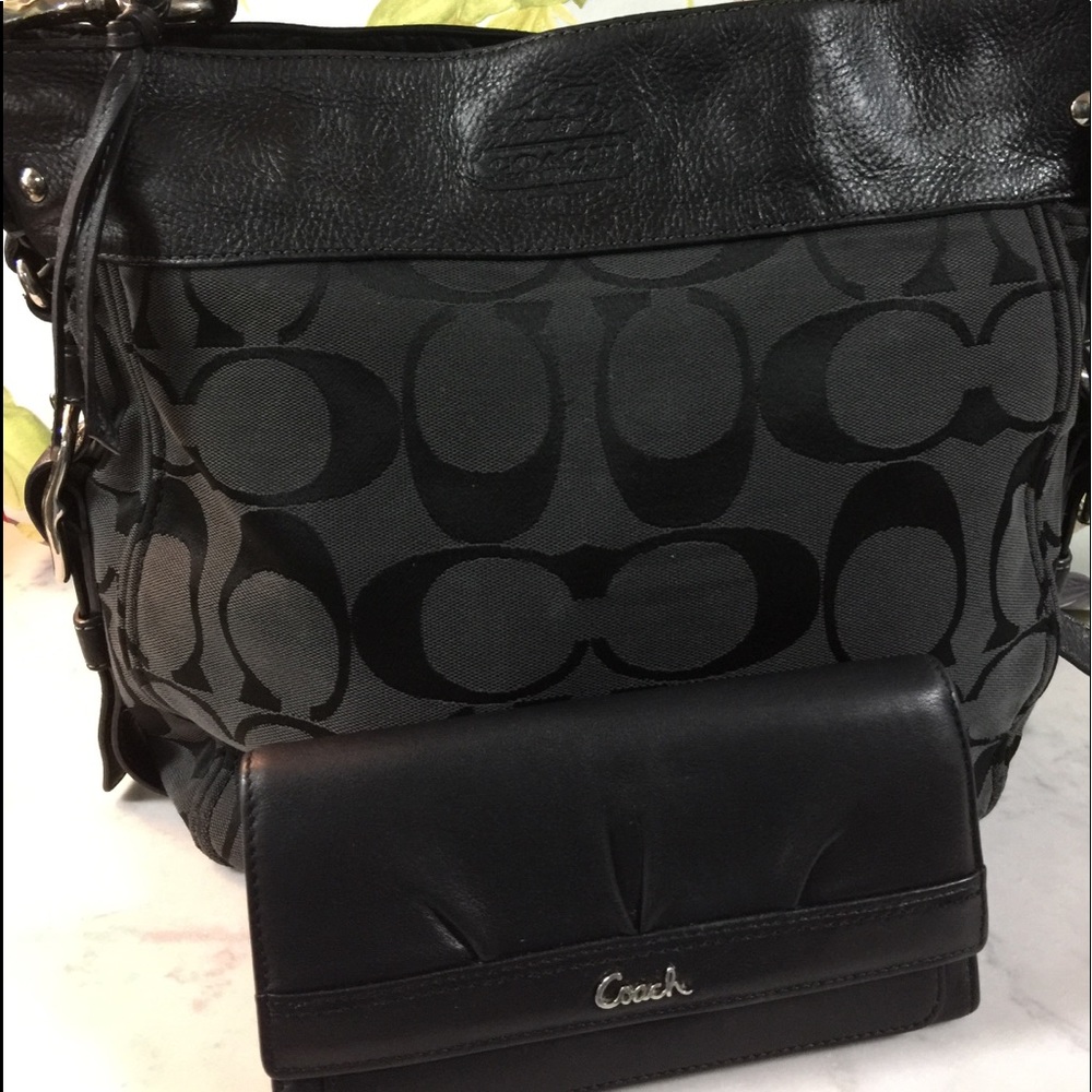 Black stunning coach purse